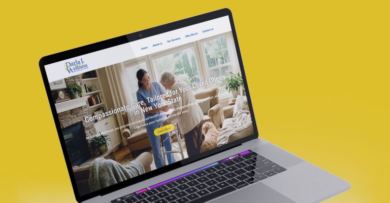 Darla J Wellness homepage on laptop